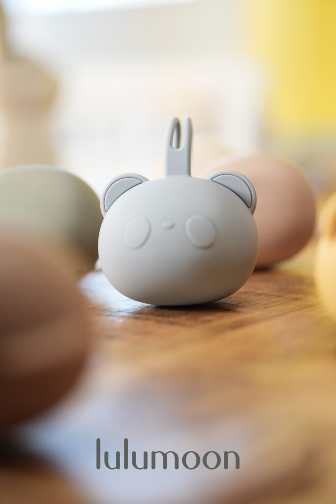 Guardachupete de silicona Lulumoon, fácil de lavar, con enganche para carrito o bolso.