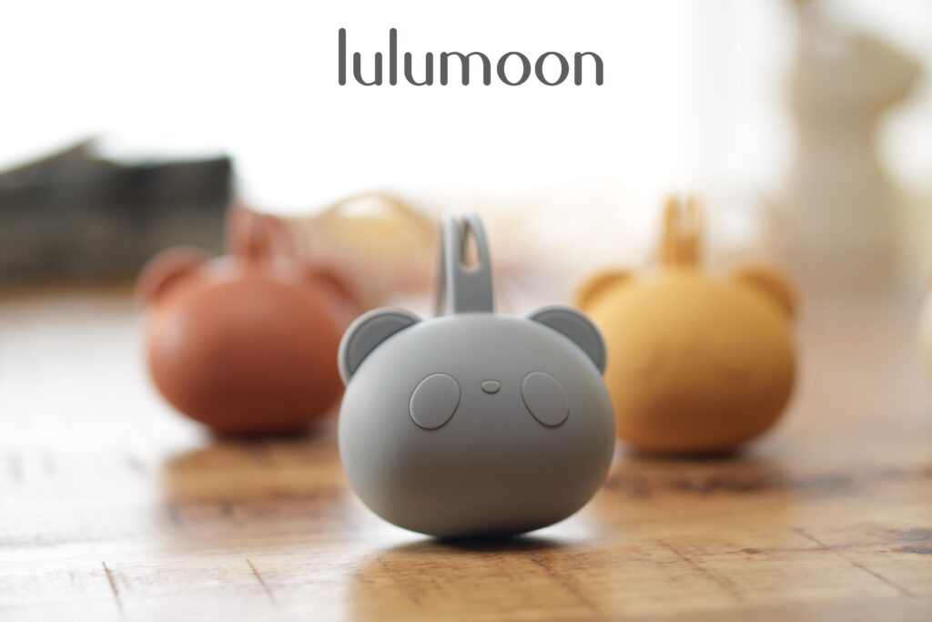 Guardachupete de silicona Lulumoon, fácil de lavar, con enganche para carrito o bolso.