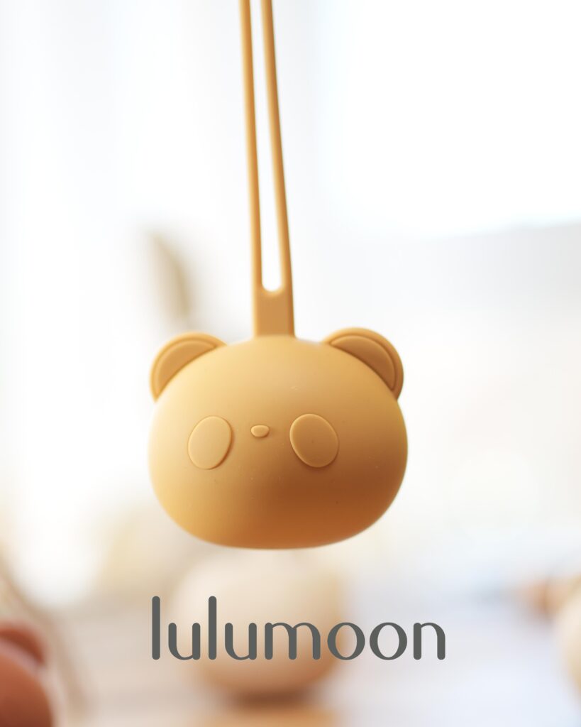 Guardachupete de silicona Lulumoon, fácil de lavar, con enganche para carrito o bolso.